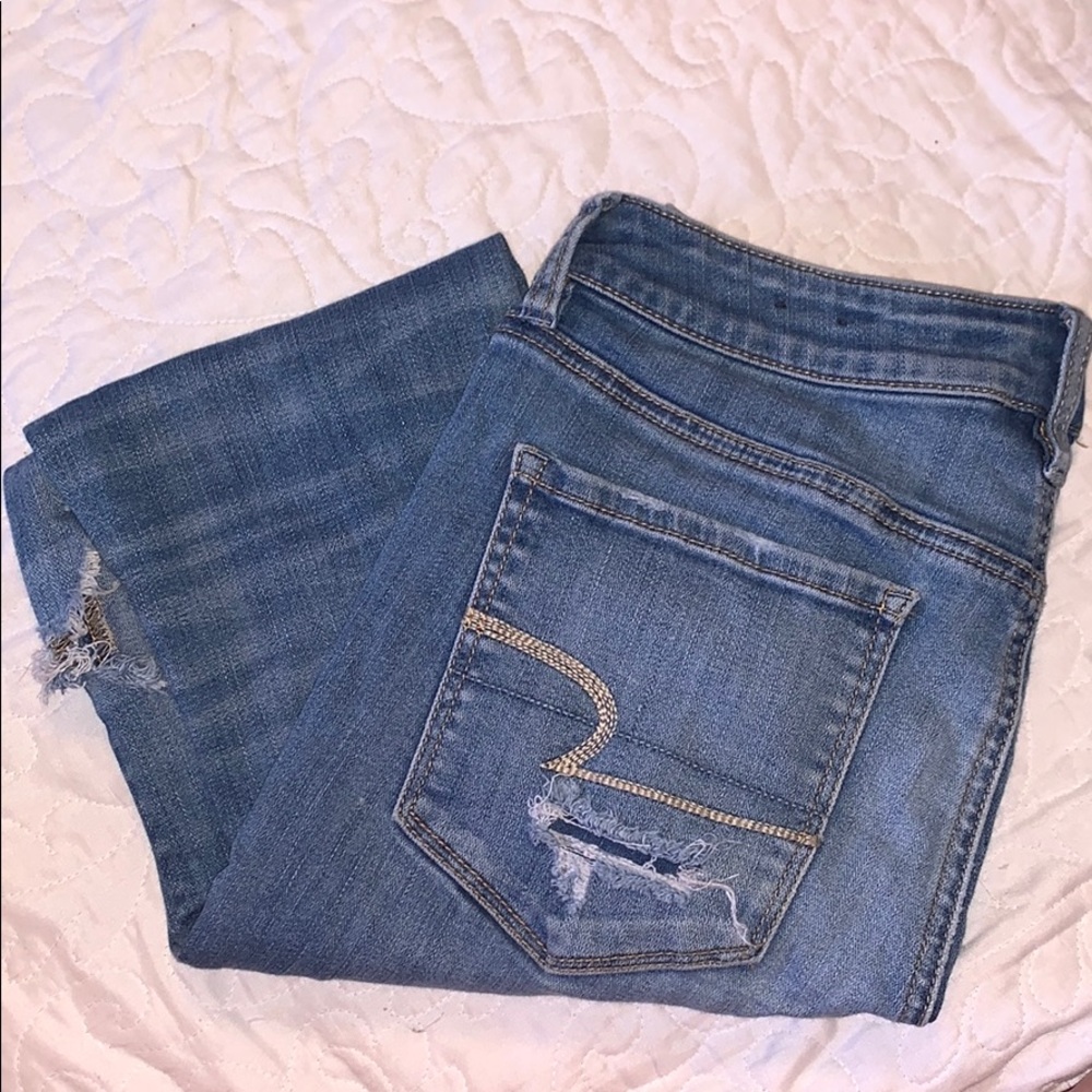 American Eagle light wash distressed denim